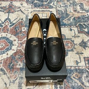 Coach, black leather slip on